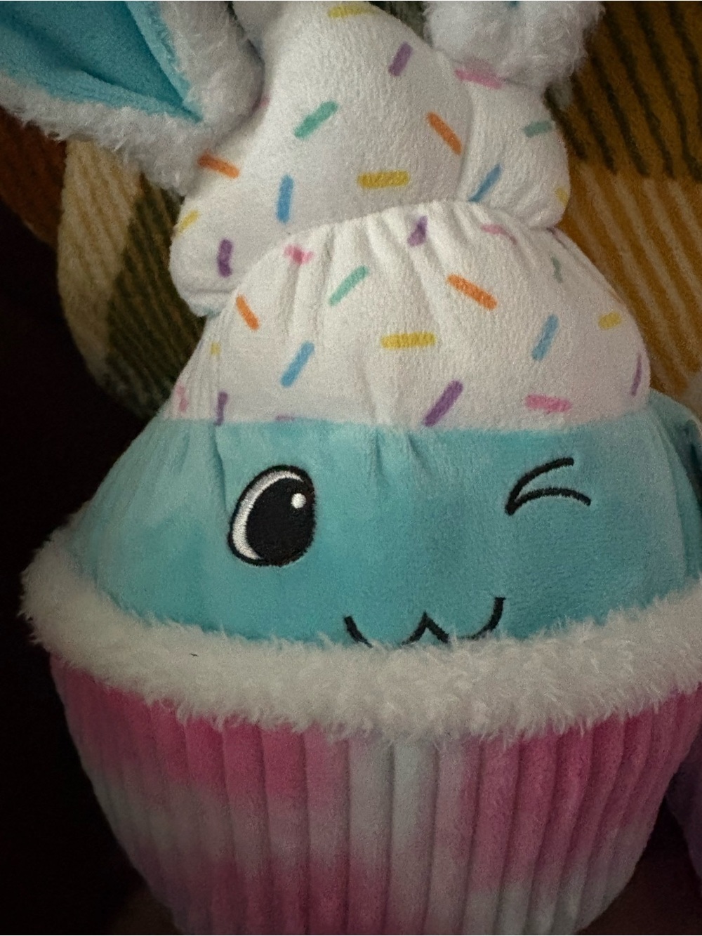 Two Plush cupcakes . 13in height 20 in round , pastel colors , multi / solid